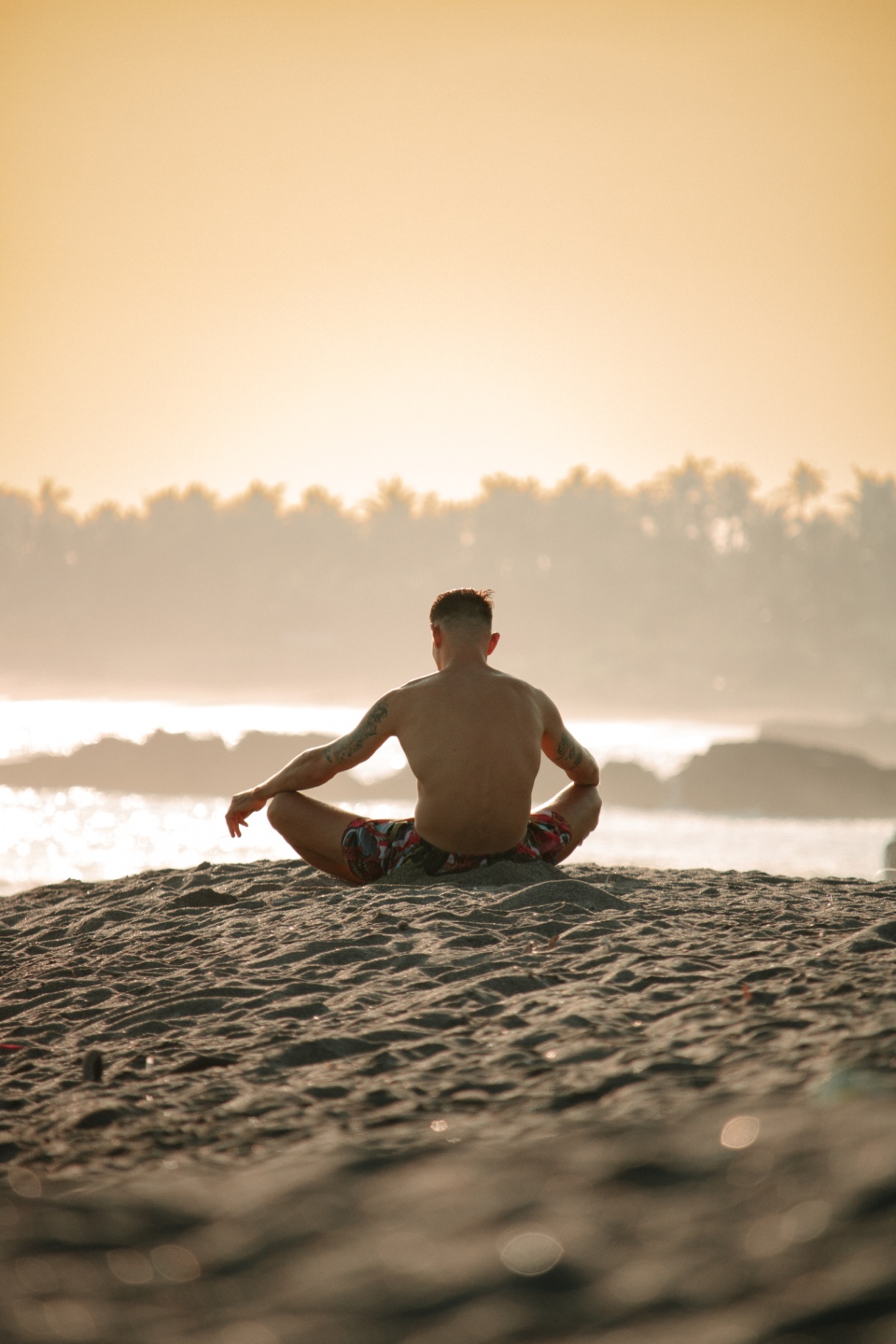 Meditation on the beach at golden hour
