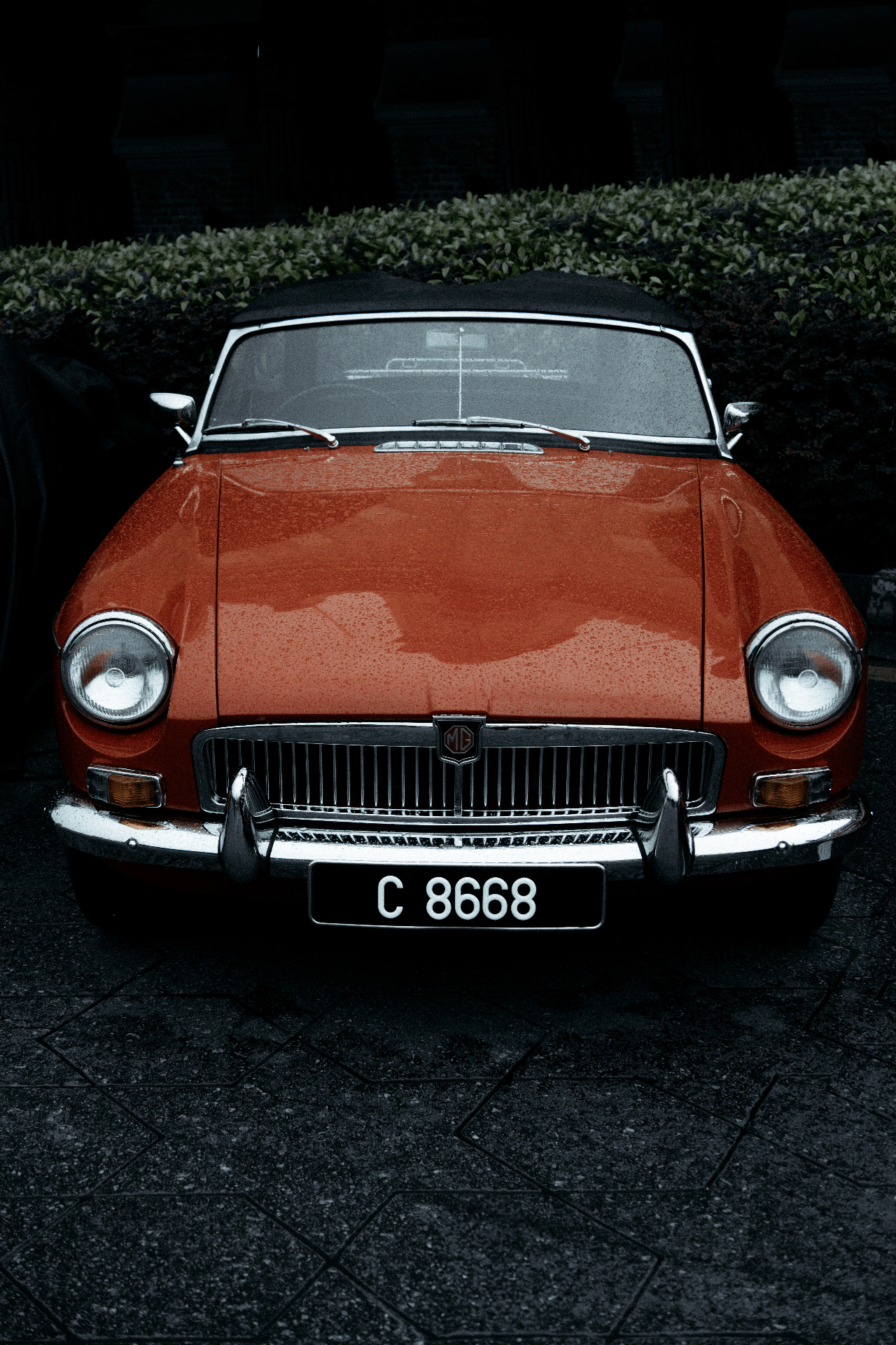 Classic MG convertible in the rain